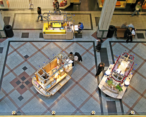 Kiosk Booths in Mall from above . 2 booths, with tile floor. Vendor Insurance | Exhibitor Insurance | Kiosk Insurance 